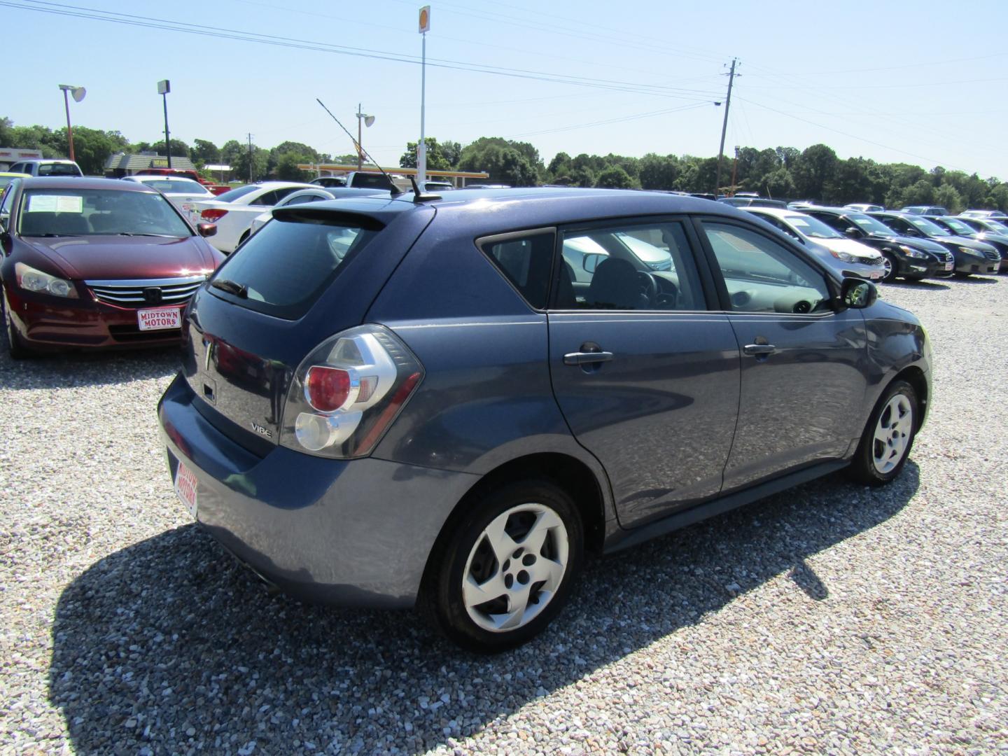 2009 Blue /Gray Pontiac Vibe 1.8L (5Y2SP67819Z) with an 1.8L L4 DOHC 16V engine, 4-Speed Automatic Overdrive transmission, located at 15016 S Hwy 231, Midland City, AL, 36350, (334) 983-3001, 31.306210, -85.495277 - Photo#7